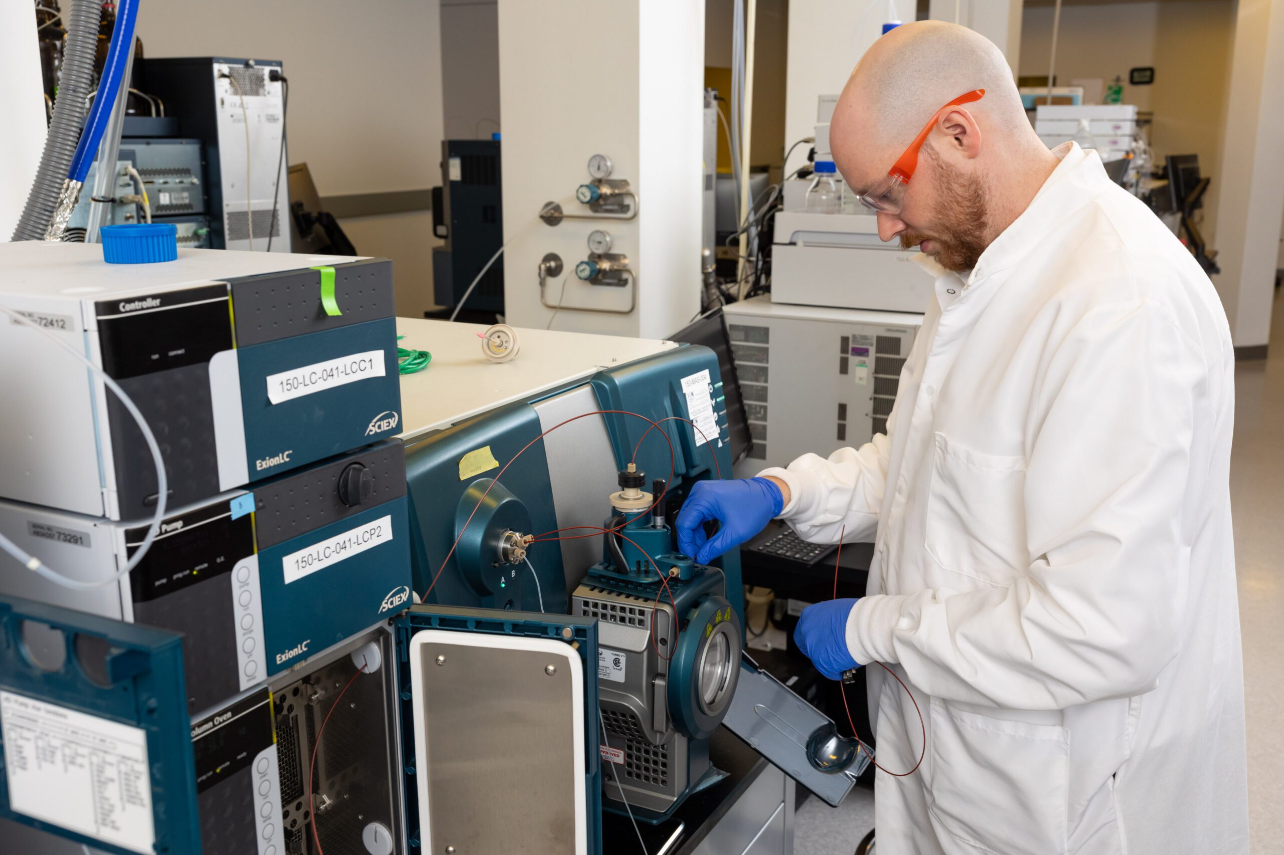 Scientist performing bioanalytical services using LC-MS/MS instrumentation in a pharmaceutical laboratory. Scientist performing in vitro release and permeation testing (IVRT/IVPT) using diffusion cells in a pharmaceutical laboratory